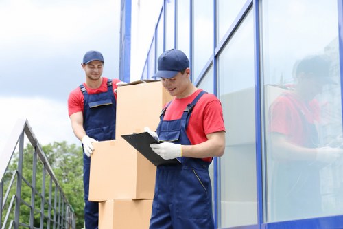 Local removals service planning in Wembley with moving boxes and van