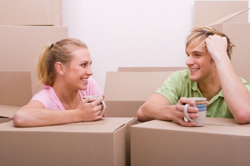 Moving van and loader handling household items