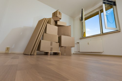 Local movers handling furniture during a Wembley home move
