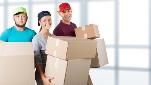 Professional house removalists in Wembley loading furniture into a moving truck