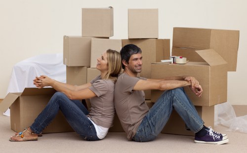 Wembley removalists unloading furniture and boxes at a new house